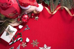 Merry Christmas and Happy New Year decoration for celebration on red cloth background with copy space photo