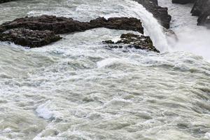 rocks in Gullfoss waterfall in autumn photo