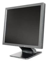 old used black LCD monitor isolated on white photo