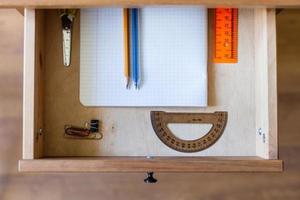 stationery set in open drawer photo