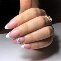 French manicure on the nails. French manicure design. Manicure gel nail polish photo