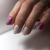 Manicure of different colors on nails. Female manicure on the hand photo