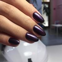 Purple manicure on the nails. Purple nail design on the fingers. photo