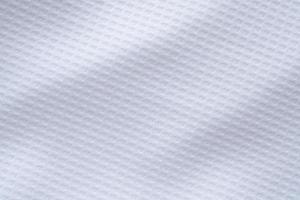 White sports clothing fabric football shirt jersey texture abstract background photo