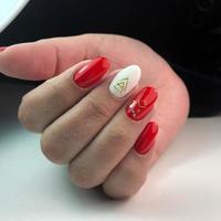 hand with red nails manicure photo
