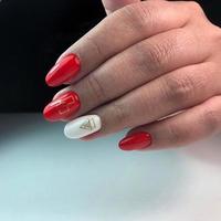 hand with red nails manicure photo