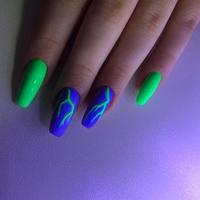 Bright multi-colored design of manicure.Multicolored manicure close up photo