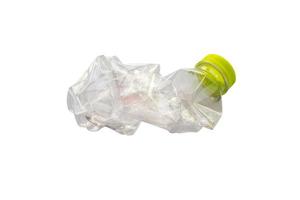 Crushed plastic bottle isolated on white background with clipping path photo