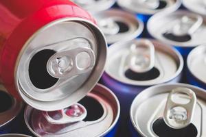 Empty aluminium drink cans recycling background concept photo