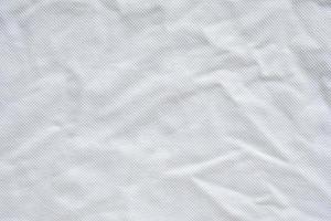 fondo de textura de jersey de ropa deportiva de tela blanca foto