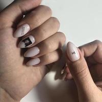 Stylish trendy female pink manicure.Hands of a woman with pink manicure on nails photo