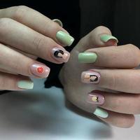 Bright multi-colored design of manicure.Multicolored manicure close up photo