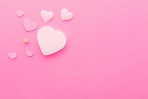 Heart Shape on pink paper background for Love and happy Valentines day with copy space photo