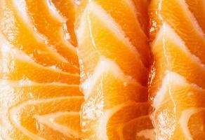 fresh salmon slice sashimi texture background photo