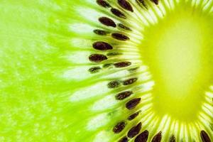 Fresh kiwi fruit slices closeup macro texture background photo