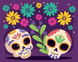 dia de los muertos skulls with floral pattern vector