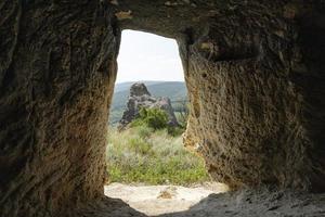 Ancient cave city, Baqla, View from inside the cave. photo