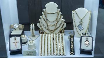 Yalta, Crimea-June 8, 2021 Gold jewelry in the shop window photo