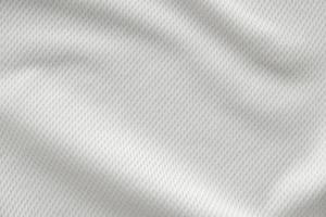 White sports clothing fabric jersey football shirt texture top view close up photo