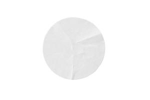 Blank white round paper sticker label isolated on white background with clipping path photo