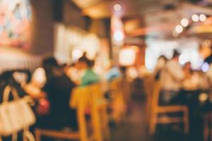 Restaurant cafe or coffee shop interior with people abstract blur background photo