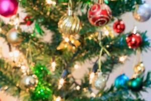 Christmas tree with bokeh light blur background photo