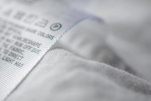 Cloth label tag with laundry care instructions photo