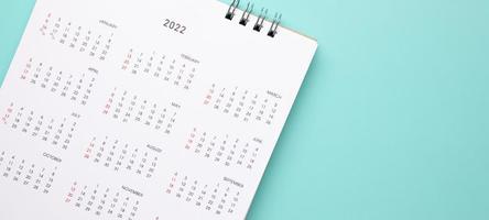 2022 calendar page on blue background business planning appointment meeting concept photo