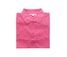 new pink shirt folded with blank clothes label isolated on white background photo