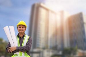 construction engineer at large condominium building site photo