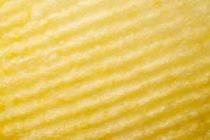 Potato chip texture background closeup photo