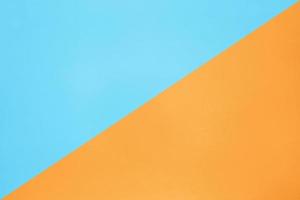 vista superior de textura de papel de color pastel azul y naranja fondo plano mínimo foto