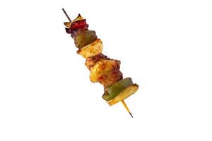 Grilled pork skewer and vegetables barbecue isolated on white background photo