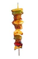 Grilled pork skewer and vegetables barbecue isolated on white background photo