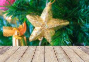 Christmas holiday background with empty rustic wood table photo