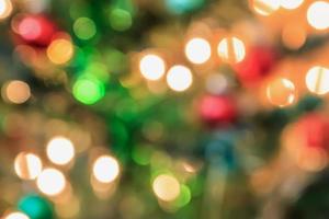 Christmas tree with bokeh light blur background photo