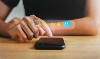 customer services best excellent business rating experience. Satisfaction survey concept. Hand of people chooses  smile face circle on mobile. 5 Star Satisfaction photo