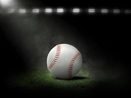 Baseball at night under stadium lights photo