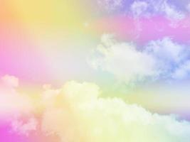 beauty sweet pastel yellow pink   colorful with fluffy clouds on sky. multi color rainbow image. abstract fantasy growing light photo