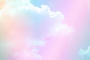 beauty sweet pink orange colorful with fluffy clouds on sky. multi color rainbow image. abstract fantasy growing light photo