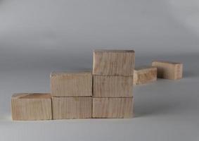 Wood block stacking as step stair. Business concept for growth success process. photo