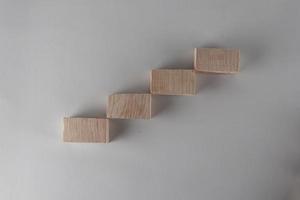 Wood block stacking as step stair. Business concept for growth success process. photo