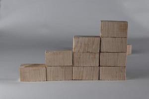 Wood block stacking as step stair. Business concept for growth success process. photo