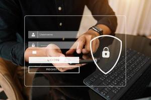 Cyber security concept, Login, User, identification information security and encryption, secure access to user's personal information man using smart phone and tablet photo