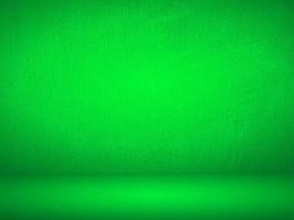 Green gradient wall. blank studio room. plain studio background photo