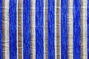 textura de primer plano de tela de tapicería tejida sintética a rayas foto