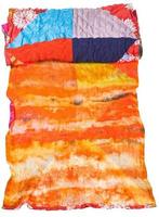 rolled silk batik and patchwork scarf isolated photo