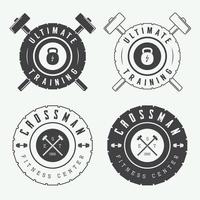 Set of gym logos, labels and slogans in vintage style vector