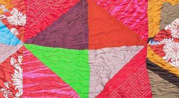 geometric pattern of silk patchwork quilt photo