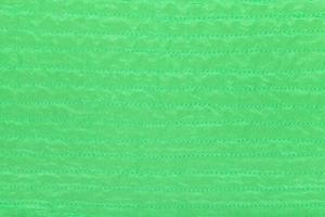 green color textile texture of stitched silk photo